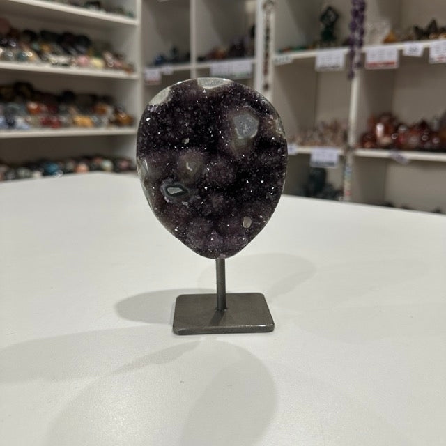 Rainbow Amethyst with Stalactite Eyes on Stand