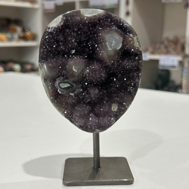 Rainbow Amethyst with Stalactite Eyes on Stand
