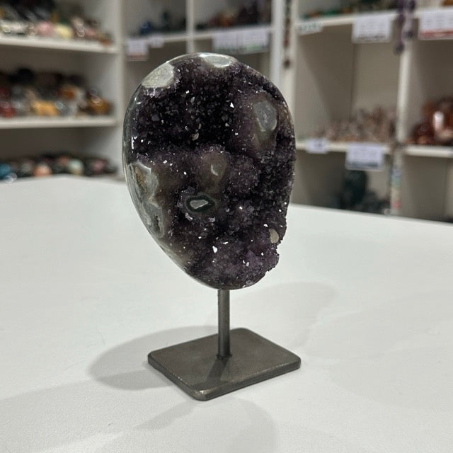 Rainbow Amethyst with Stalactite Eyes on Stand