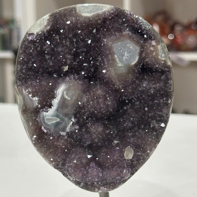 Rainbow Amethyst with Stalactite Eyes on Stand